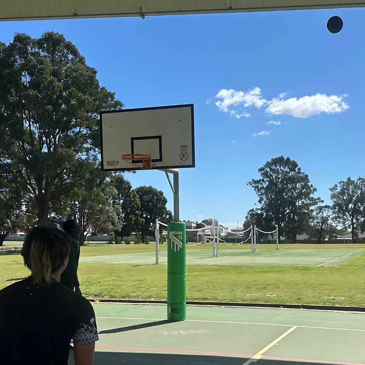 Students playing basket ball
